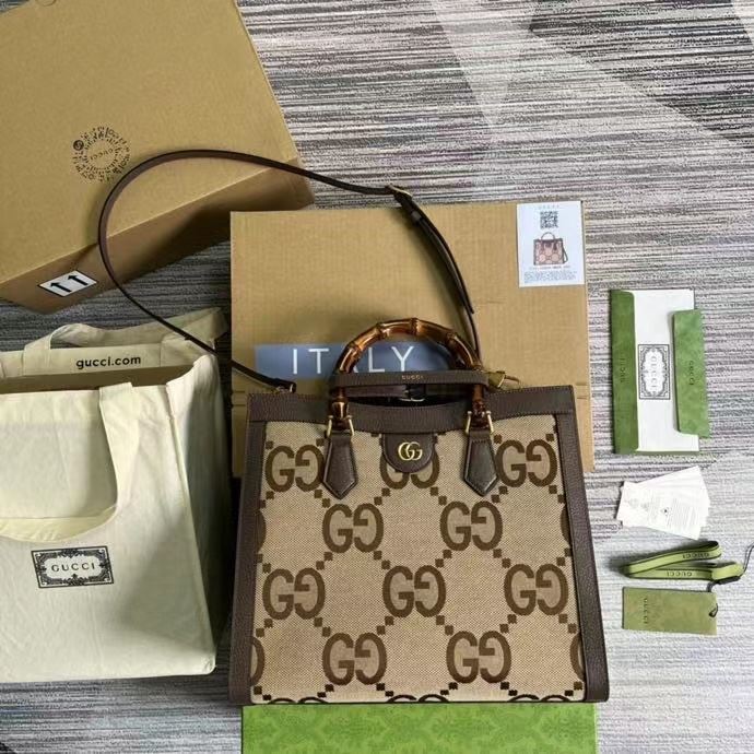 G*u*i top handle bags
